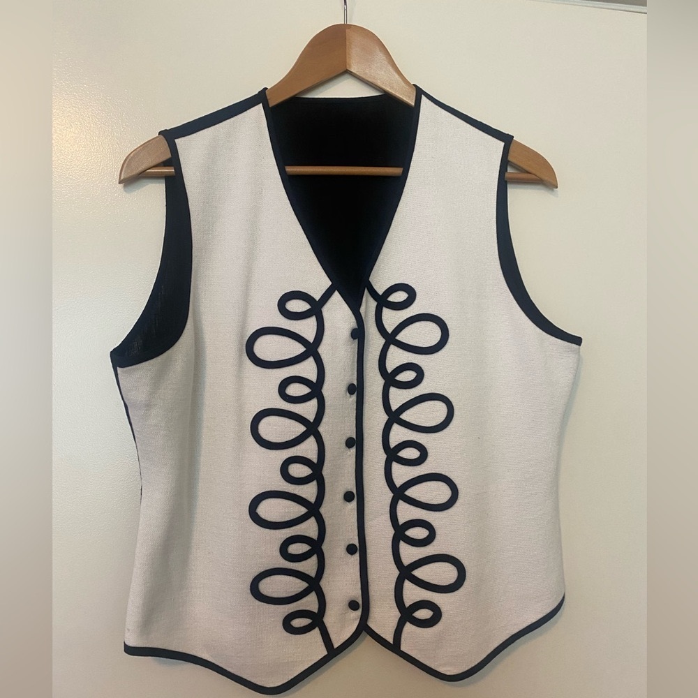 Unisex black and white vest.